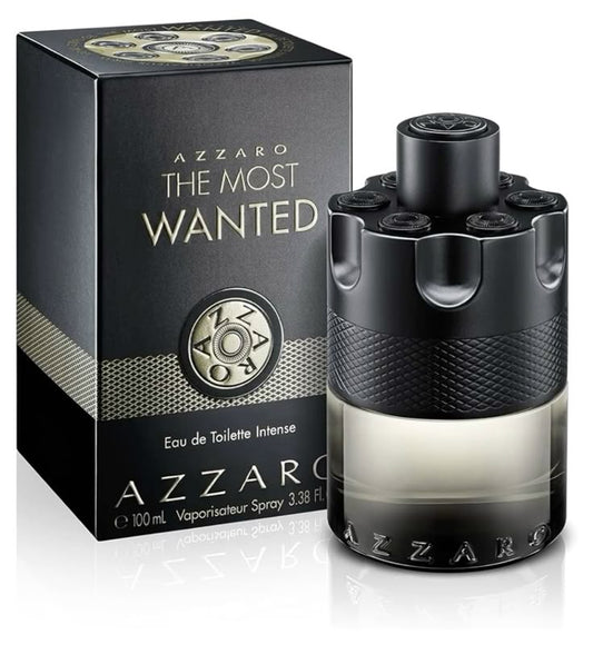 Perfume Azzaro The Most Wanted EDT 2024 100ml junto a su caja negra y dorada.